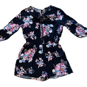 Floral romper with cut out in back 